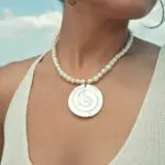 Handmade Necklace Decorated With Natural Pearls And Round Shell
