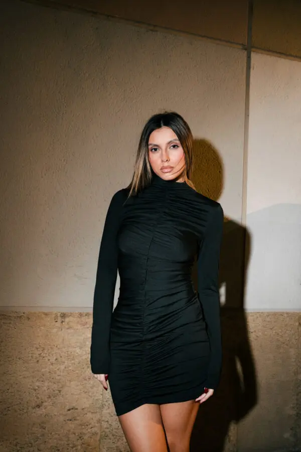 Mini Long Sleeved Dress With High Neckline And Vertical Fold Detail -Black